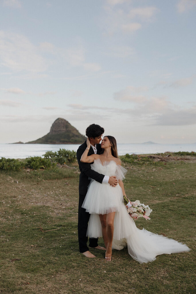 romantic bride and groom portraits on the beach