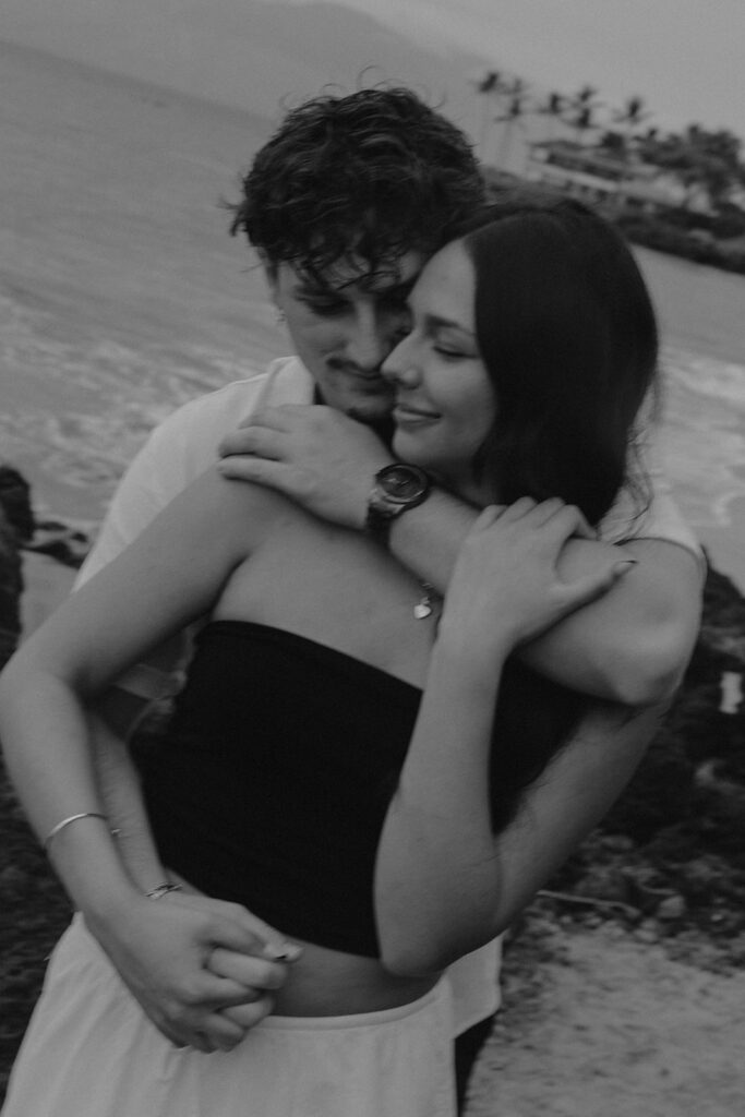 documentary style engagement photos in hawaii on the beach