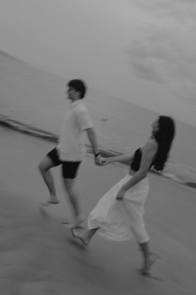 documentary style engagement photos in hawaii on the beach