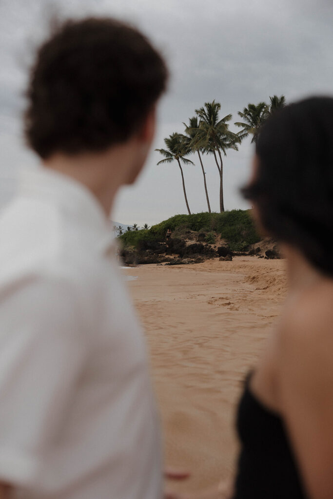 documentary style engagement photos in hawaii on the beach