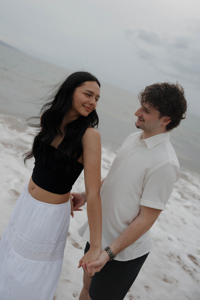 candid beach photos engagement