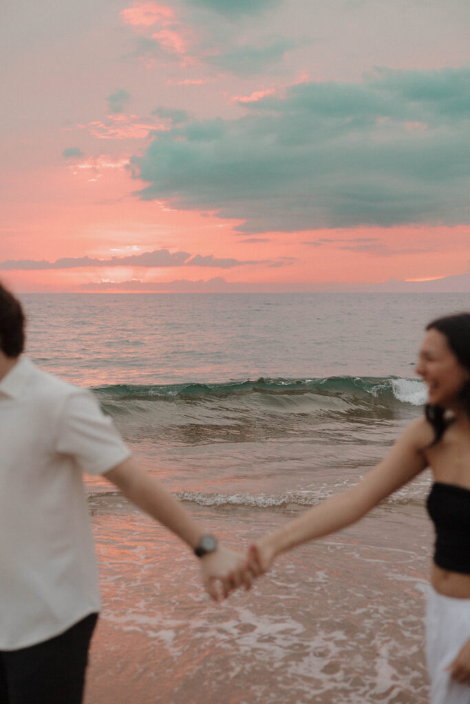 vibrant sunset couple photos in maui on the beach
