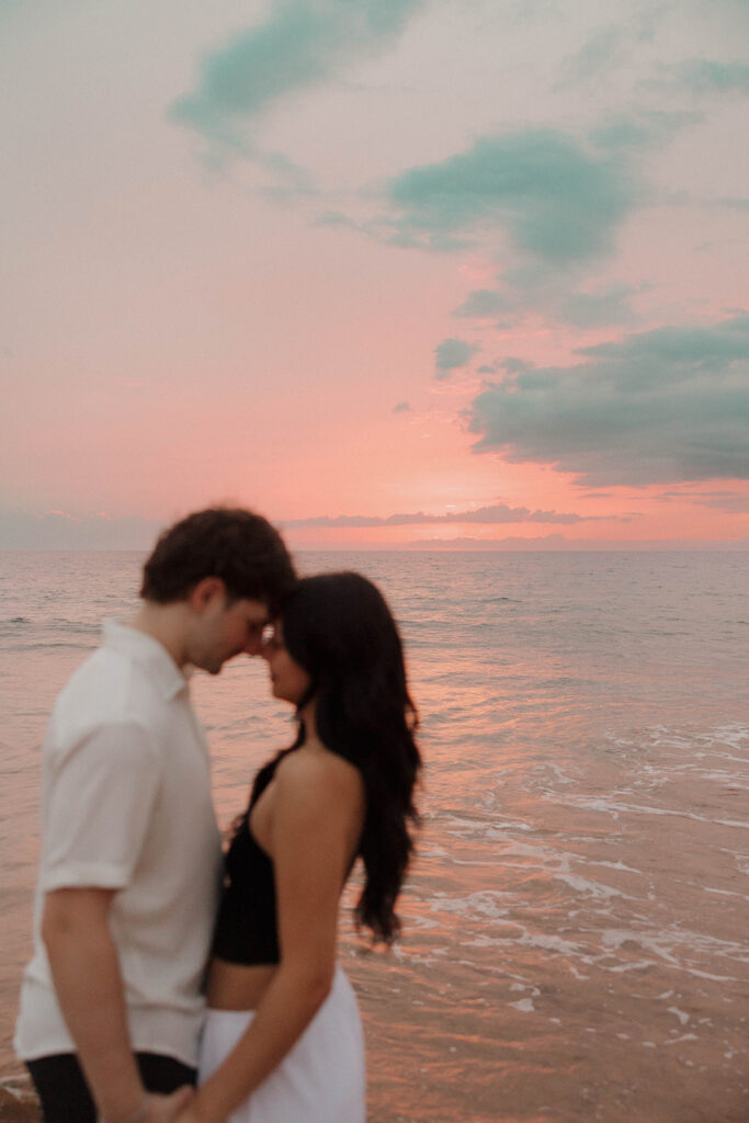 vibrant sunset couple photos in maui on the beach