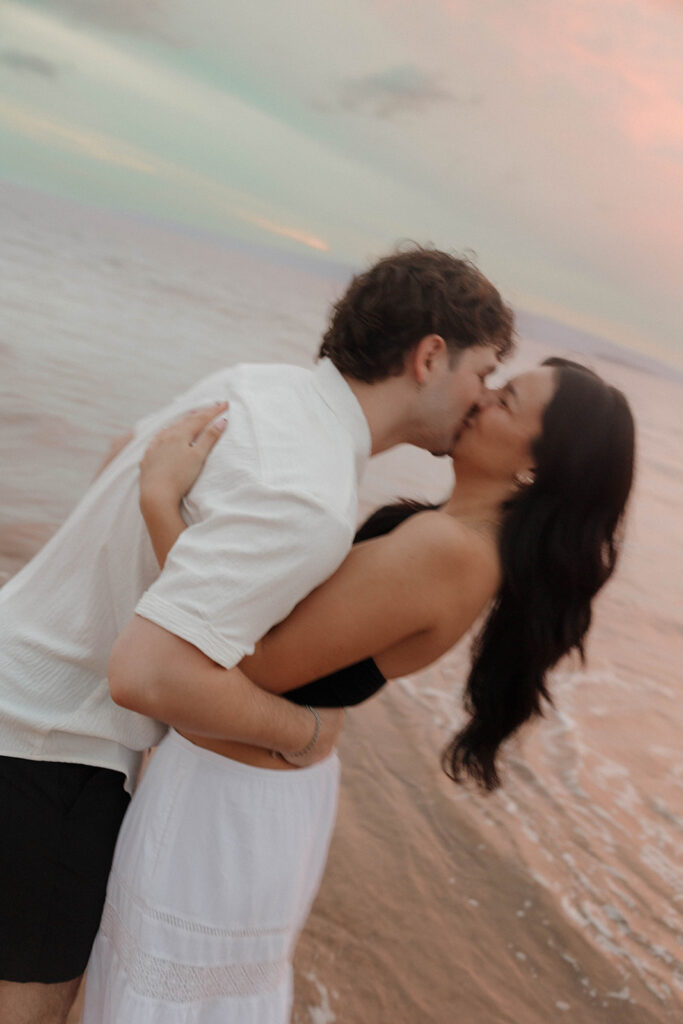 vibrant sunset couple photos in maui on the beach