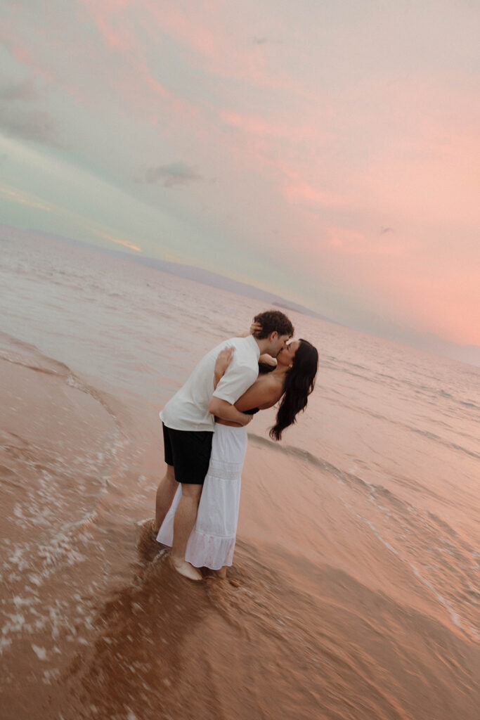 vibrant sunset couple photos in maui on the beach