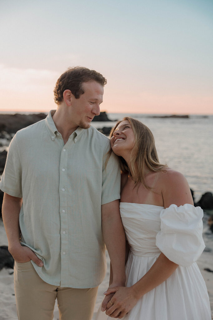 documentary style engagement photos on the beach