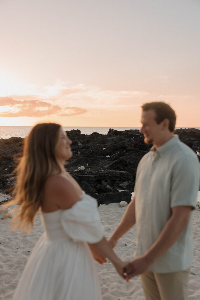 beach couples photoshoot in hawaii at sunset