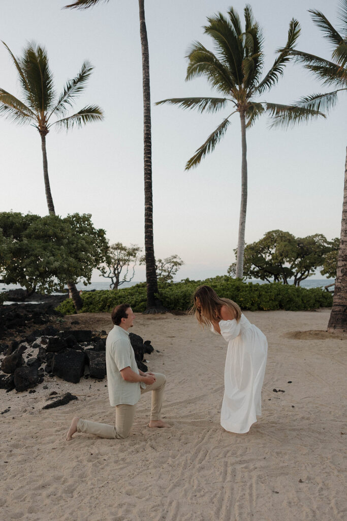 romantic beach surprise proposal in hawaii