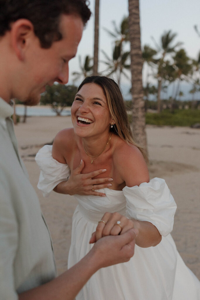 fiancee showing off ring during proposal