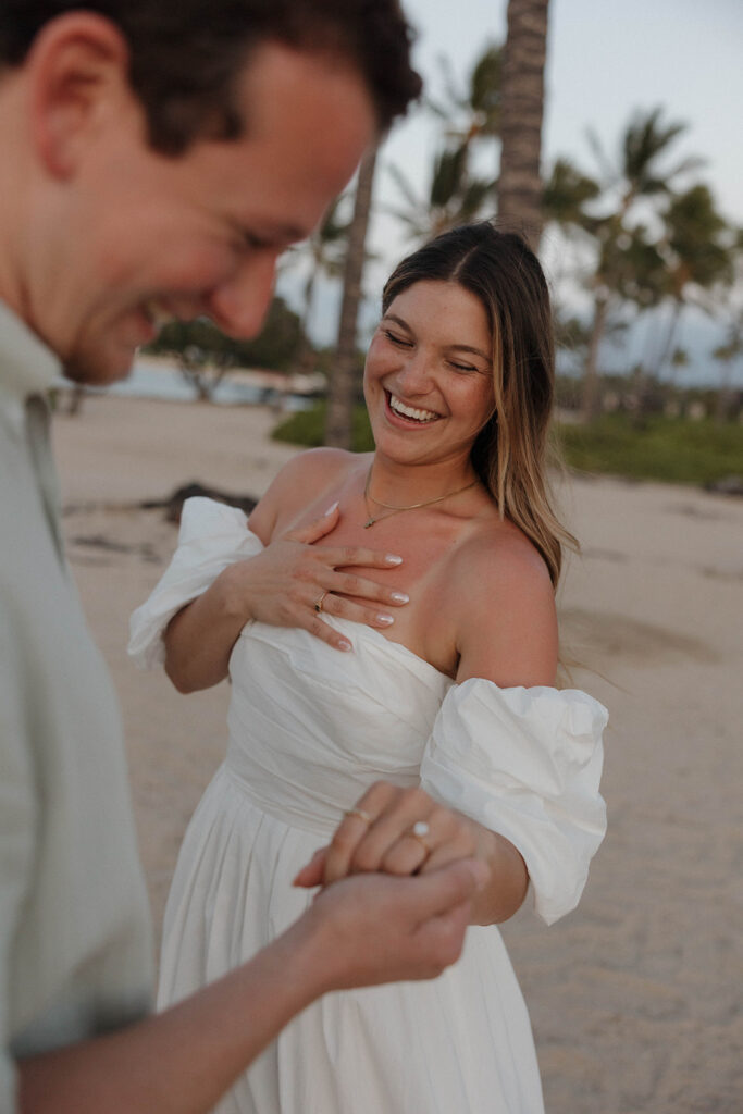 fiancee showing off ring during proposal