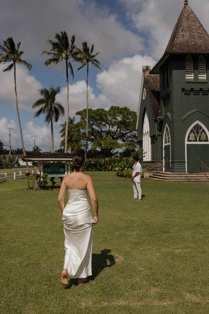 playful bride and groom photos on the beach