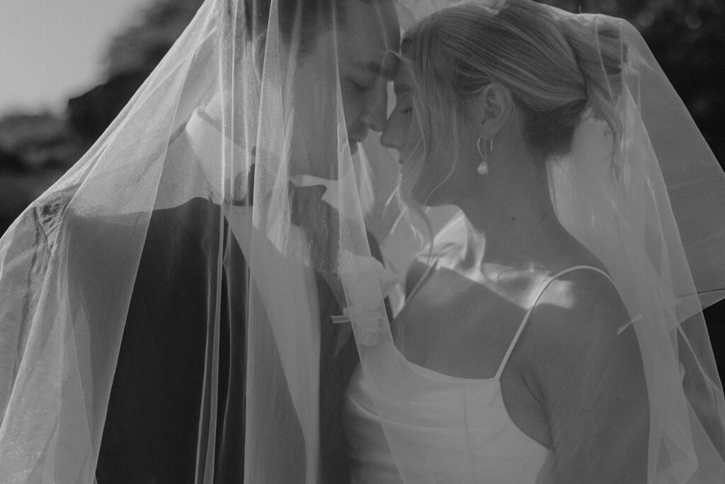 bride and groom photos on the beach at makena cove