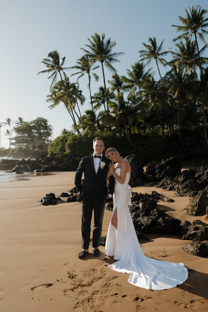 bride and groom photos on the beach at makena cove