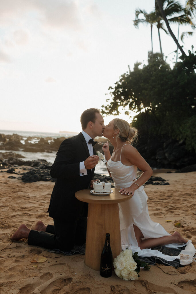 bride and groom photos on the beach at makena cove