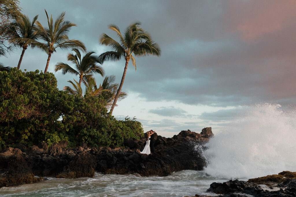 bride and groom photos on the beach at makena cove