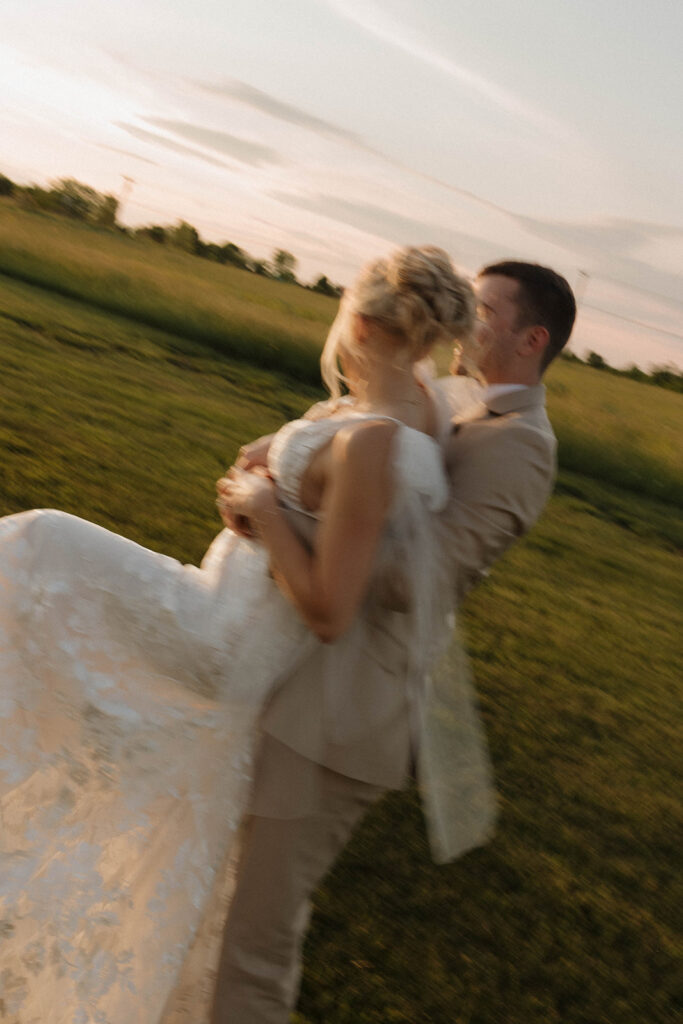golden hour wedding photos with the bride and groom after ceremony at riverview barn