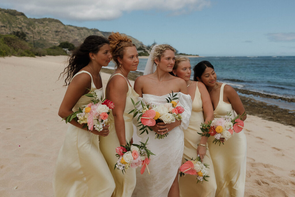 pastel yellow bridesmaid dresses with pink flowers