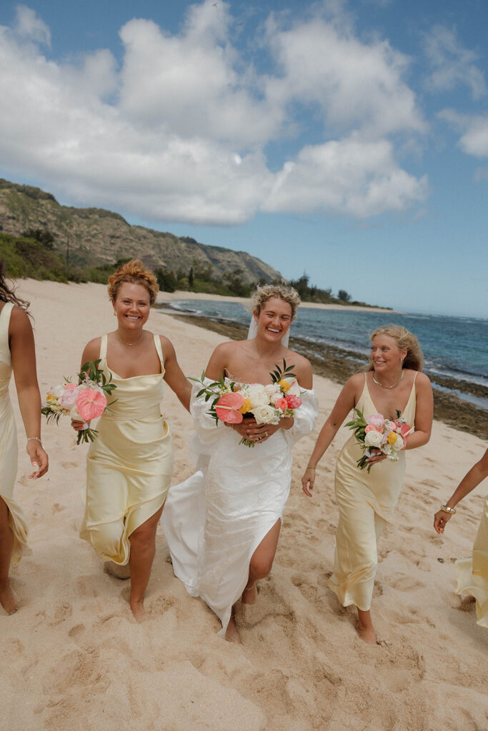 pastel yellow bridesmaid dresses with pink flowers