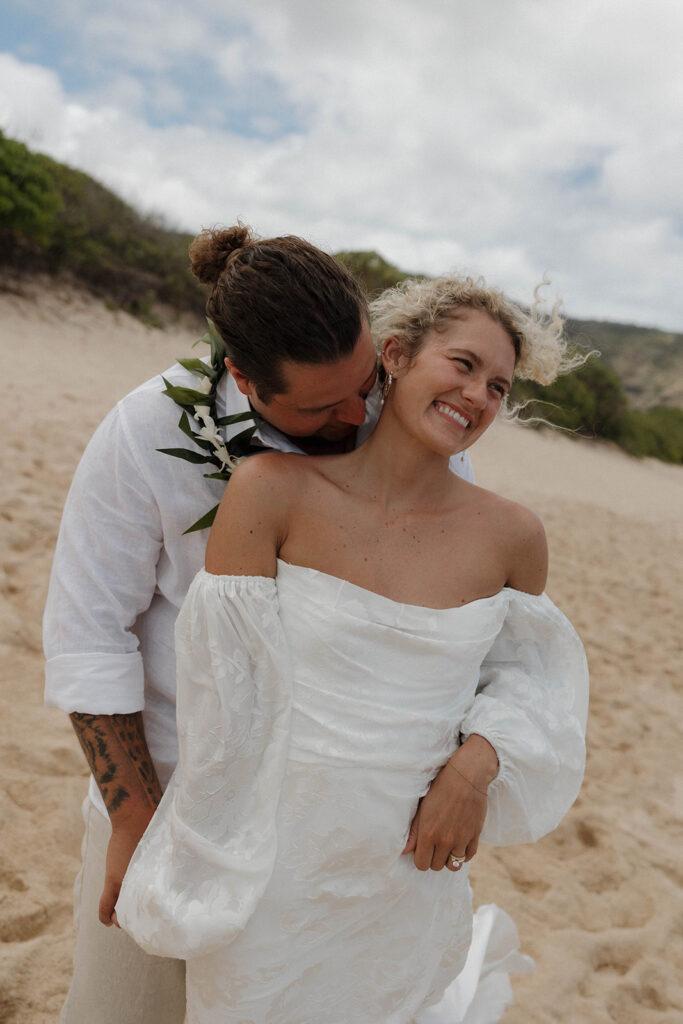 candid and playful bride and groom wedding photos in oahu