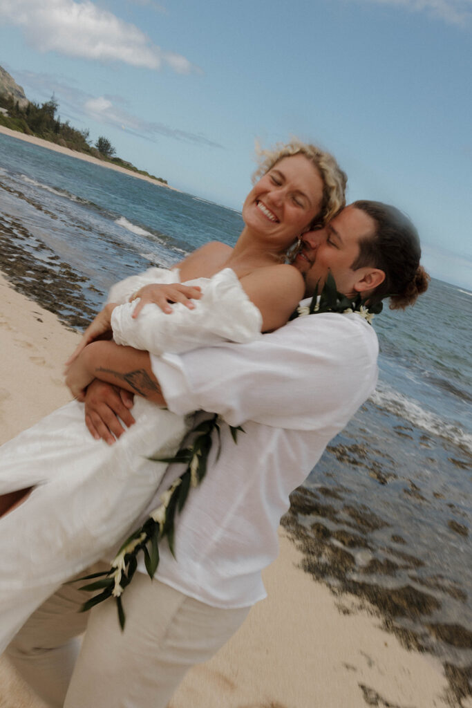 candid and playful bride and groom wedding photos in oahu