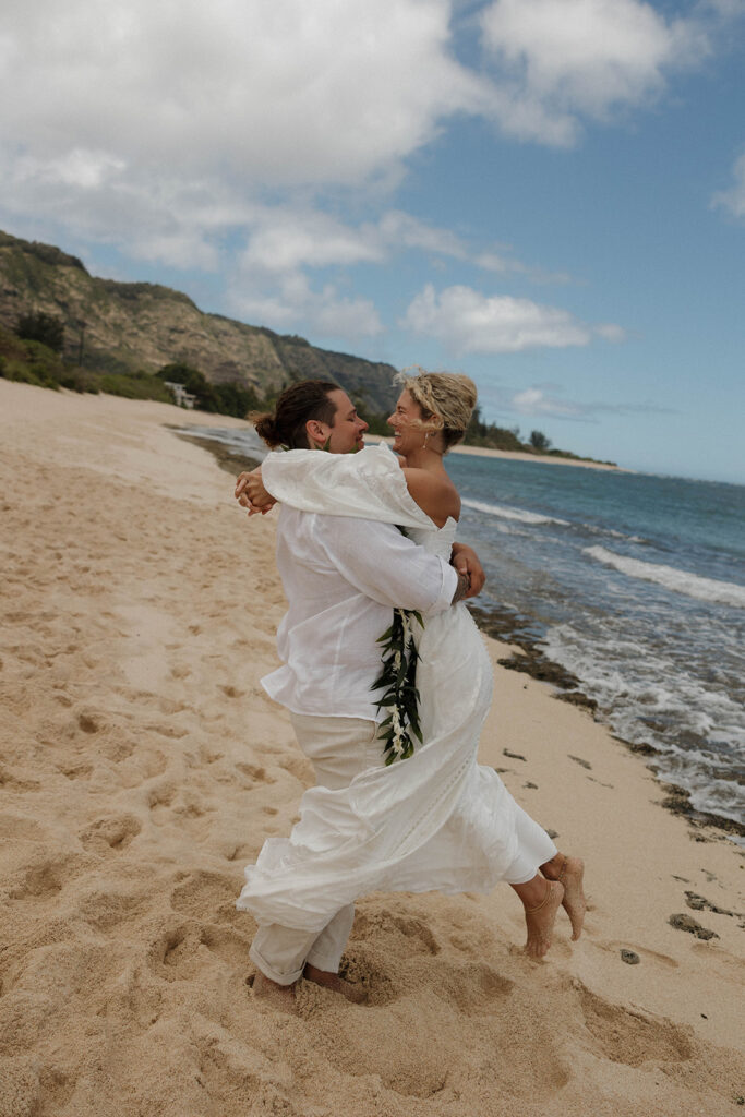 candid and playful bride and groom wedding photos in oahu