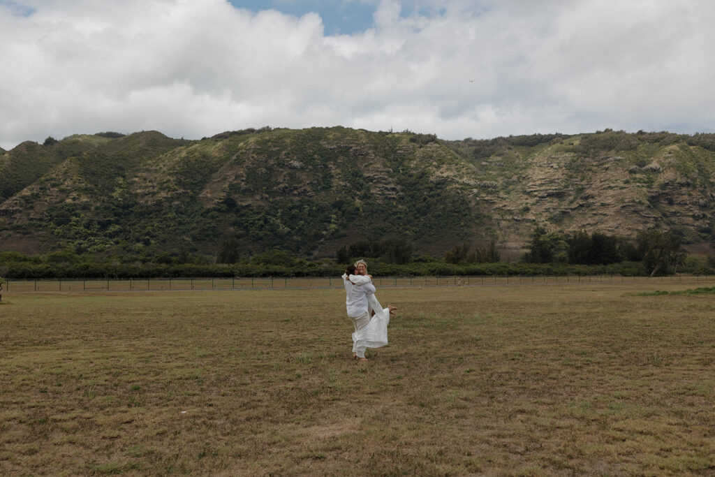 candid and playful bride and groom wedding photos in oahu