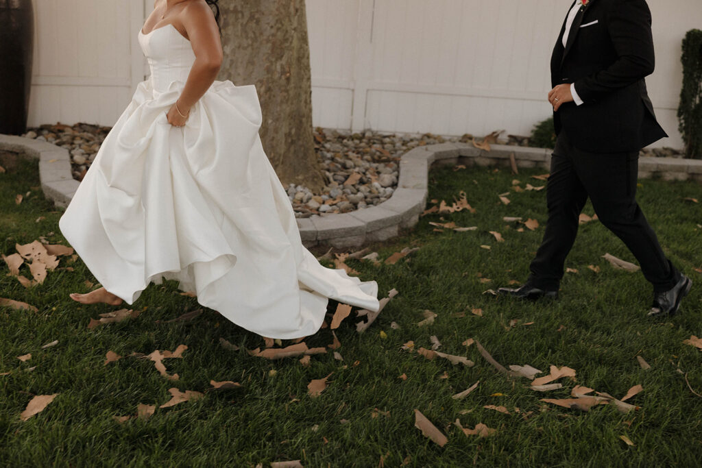 cinematic wedding photos bride and groom runnning