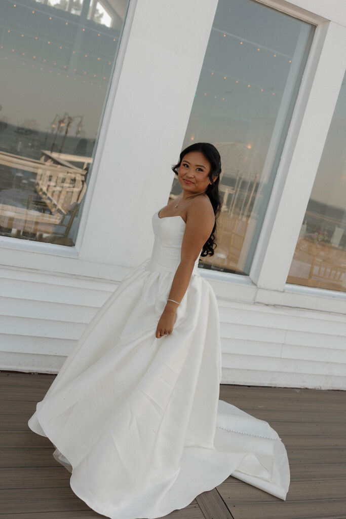 romantic bride and groom portraits by the lake in maryland