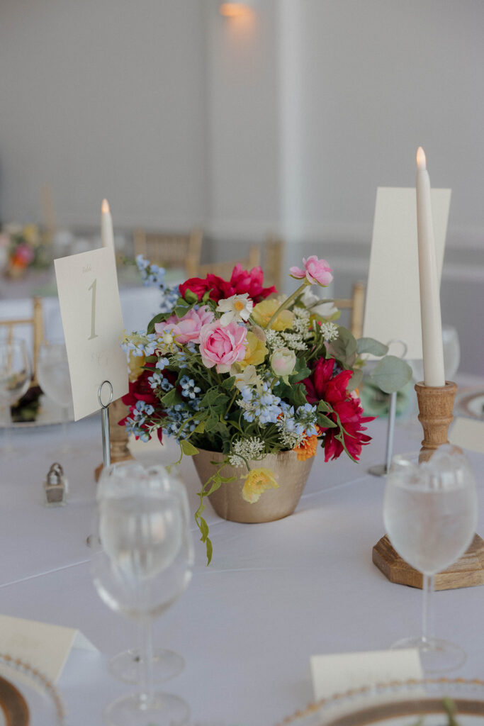 colorful wedding details florals cake and decor