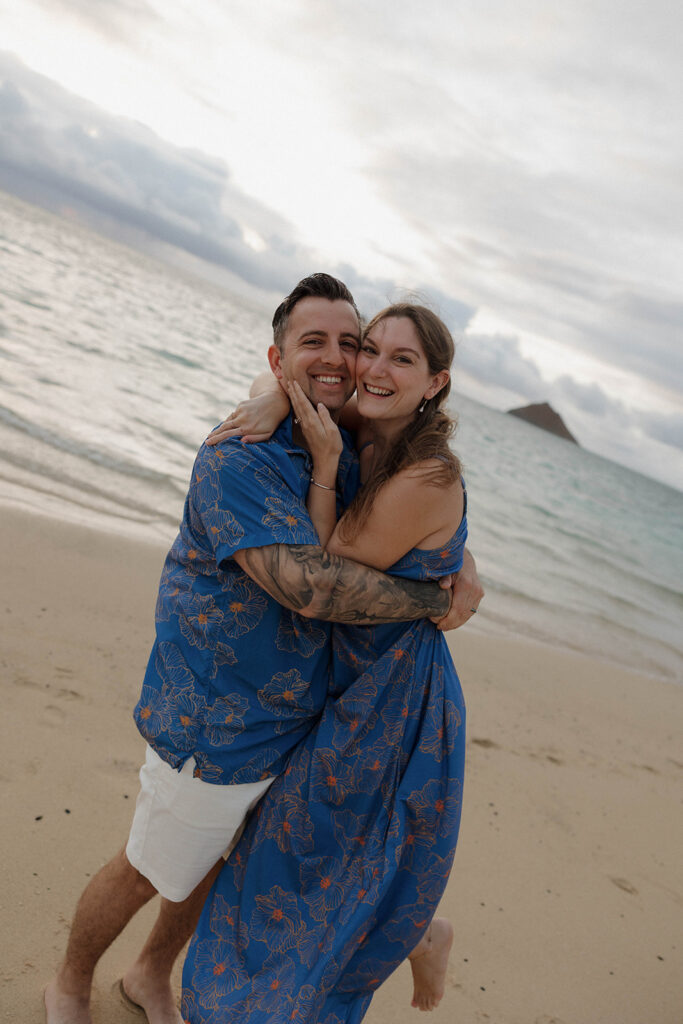 playful couple photos on the beach in hawaii
