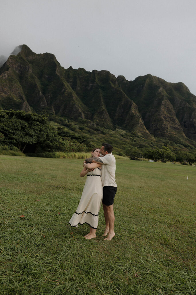 Kualoa Regional Park couples photoshoot in front of the mountains