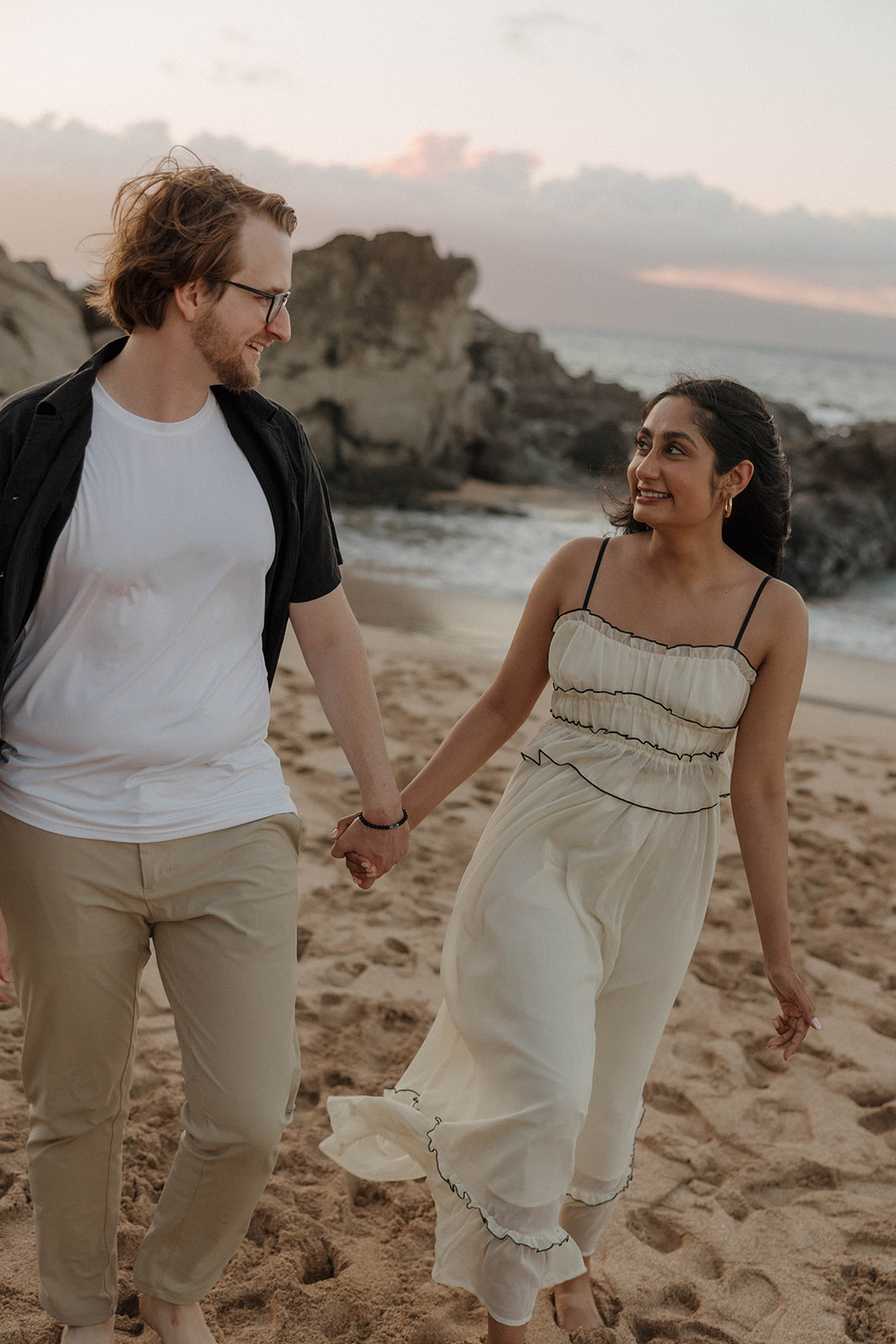 a couples beach photoshoot in Maui after a proposal 