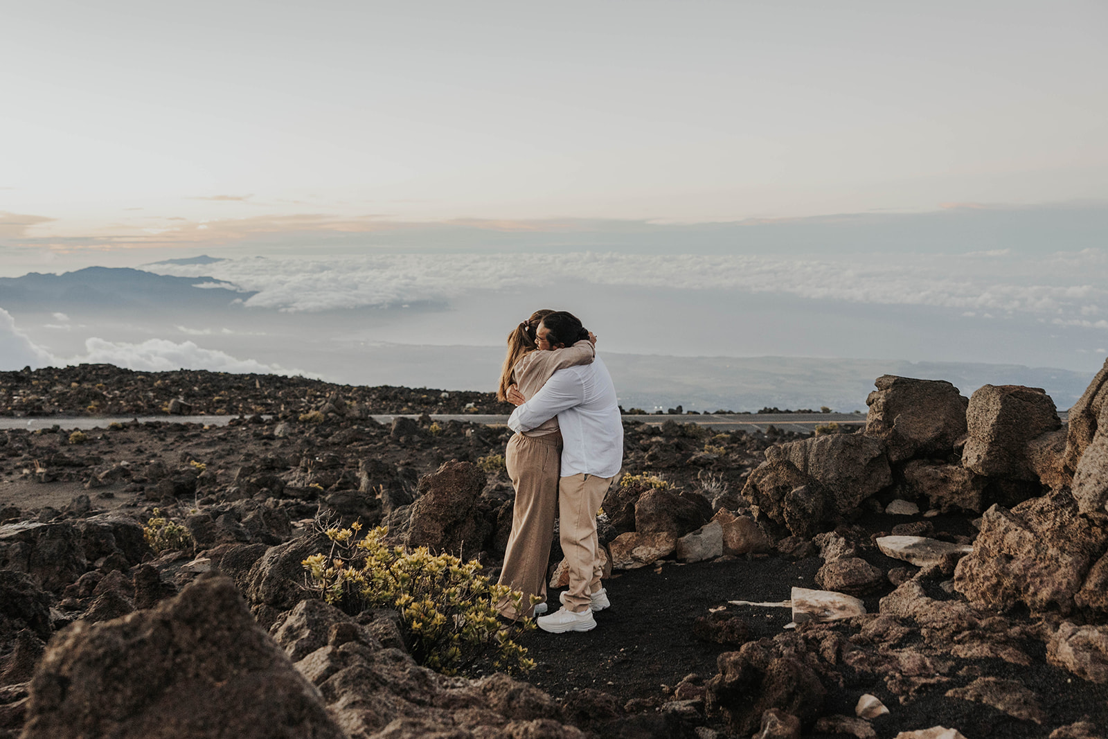 a couple hugging after she says yes to the proposal 