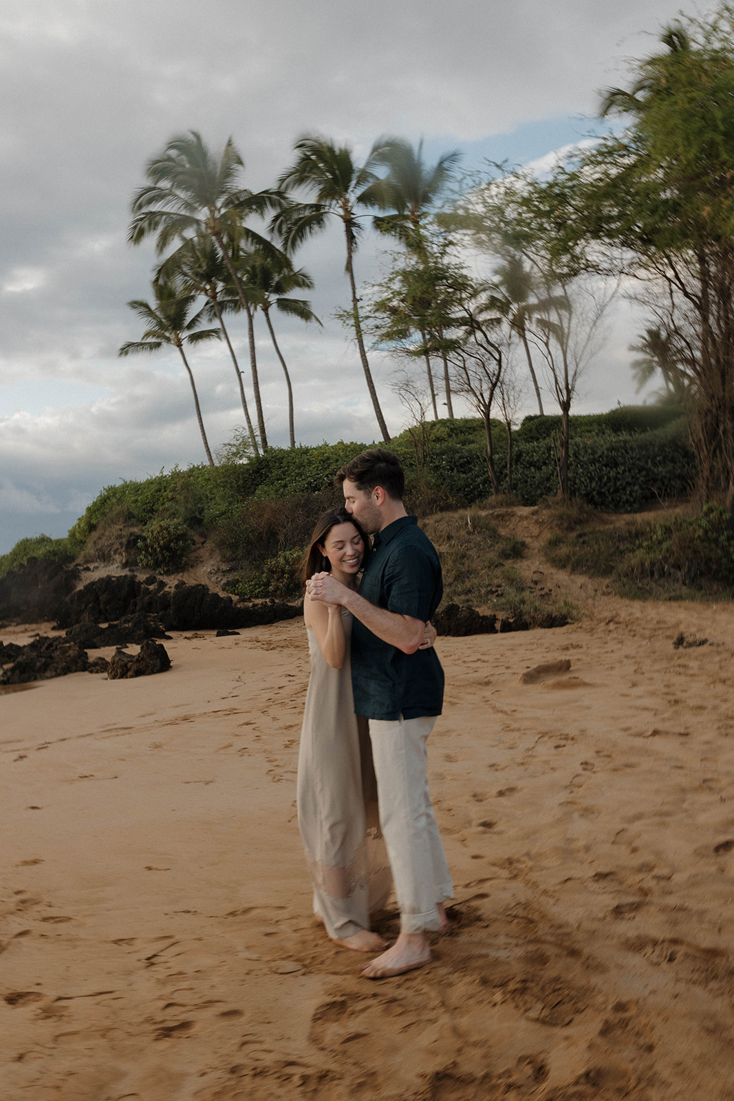 a beach couples photoshoot in Maui after a proposal 