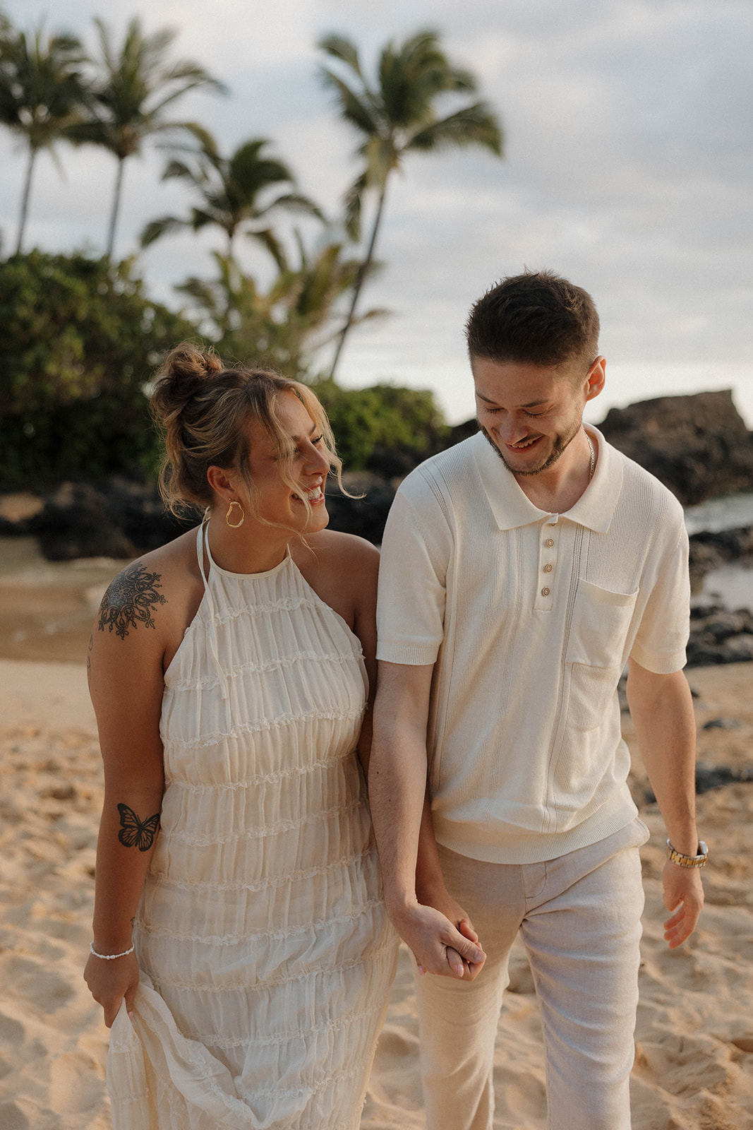 neutral colored outfits for ideas on what to wear for engagement photo outfits in Hawaii