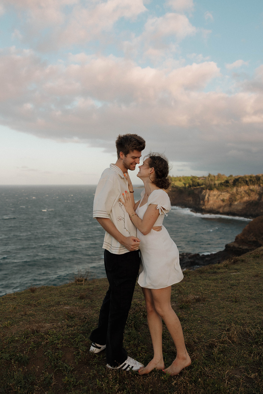 a couple showcasing what to wear for engagement photos in Hawaii 
