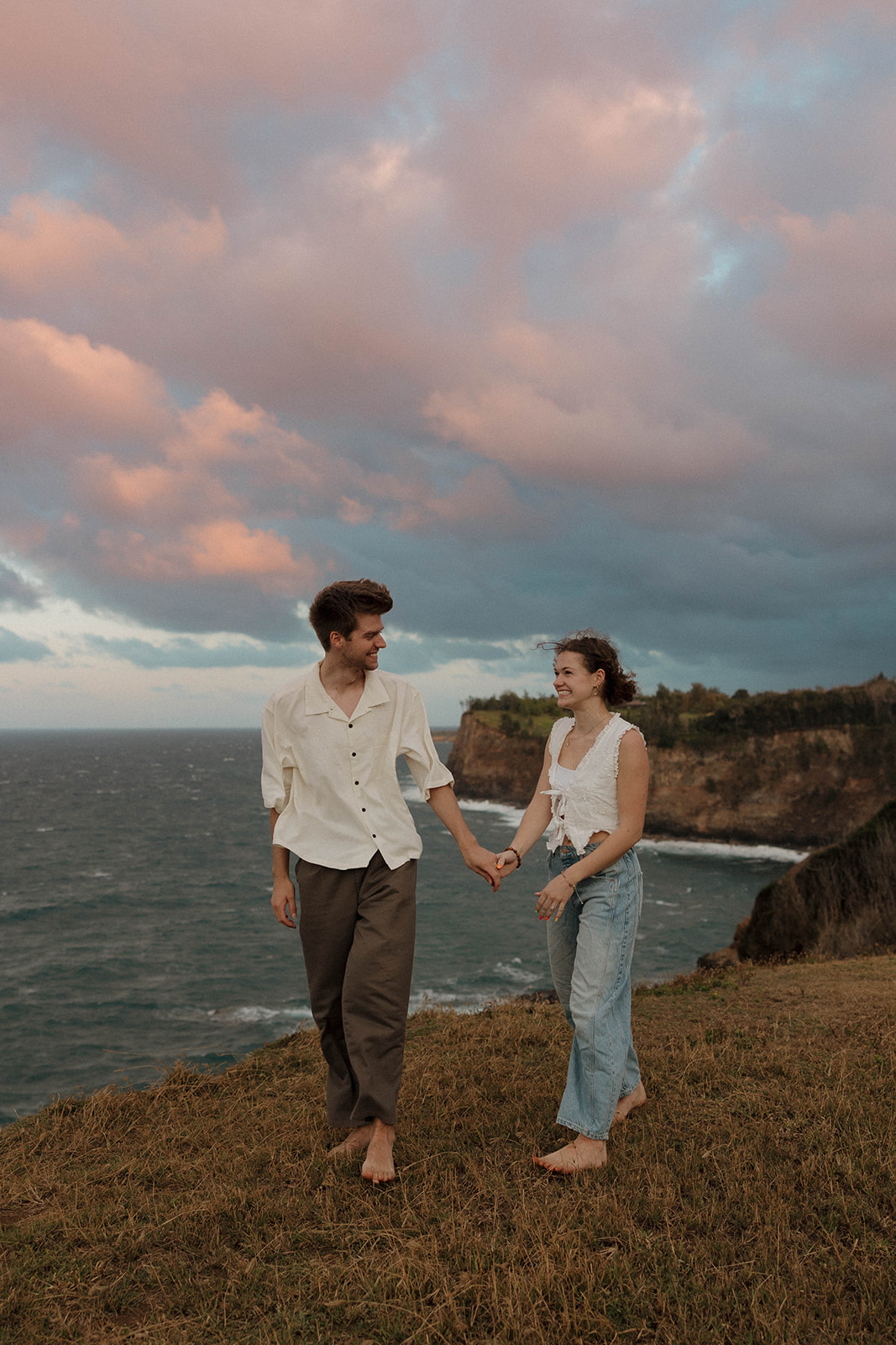 a couple smiling during their engagement photos in Hawaii 