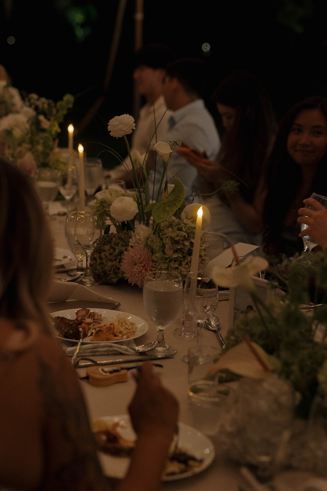 a Maui wedding reception table filled with catered food
