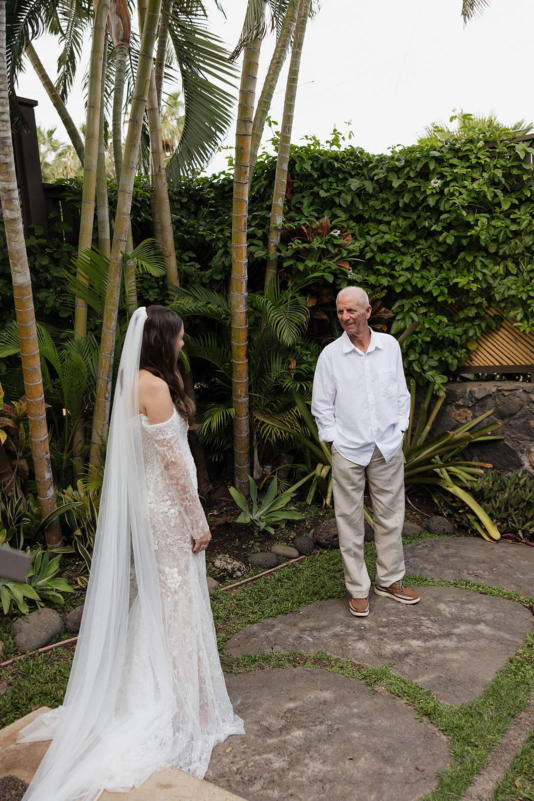 Father seeing his daughter in her wedding dress for the first time before the Maui elopement ceremony
